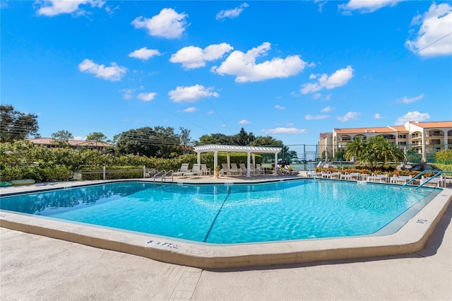 view of swimming pool featuring a patio area