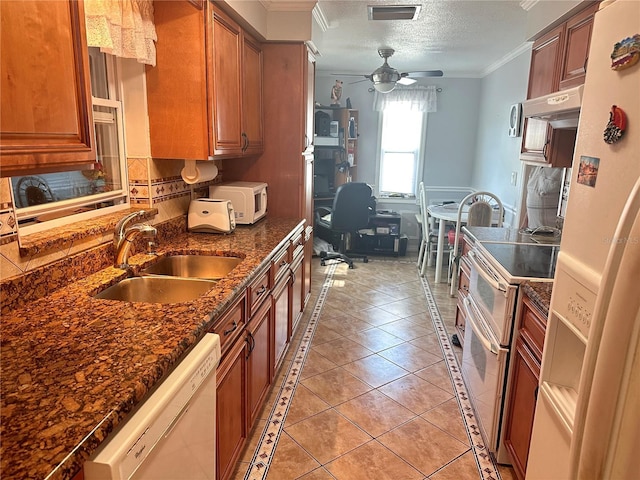 kitchen with ceiling fan, sink, range hood, crown molding, and white appliances