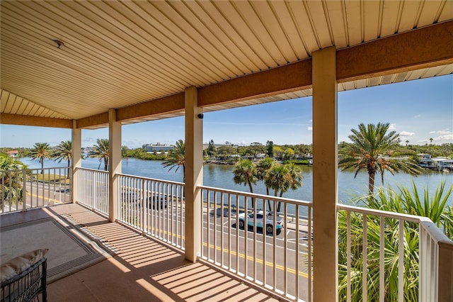 balcony featuring a water view