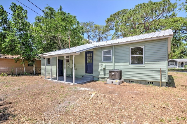 back of house with a patio area