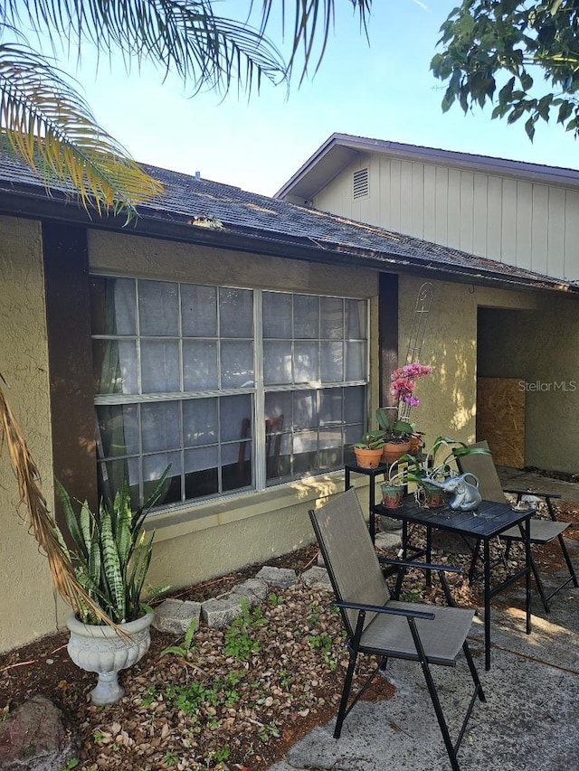 rear view of house featuring a patio area