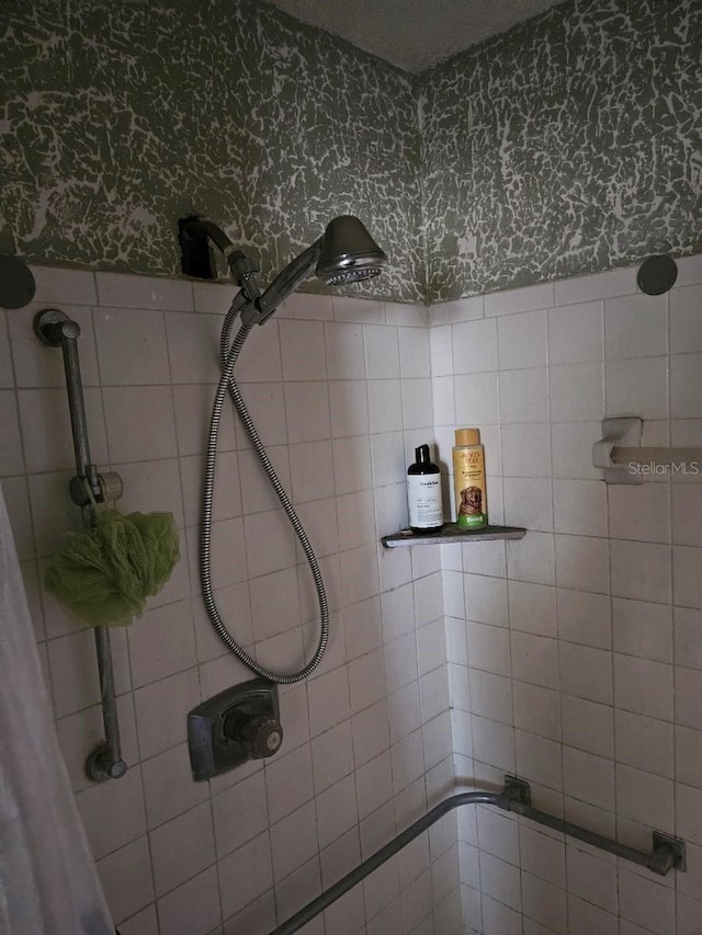 bathroom with a shower with shower curtain