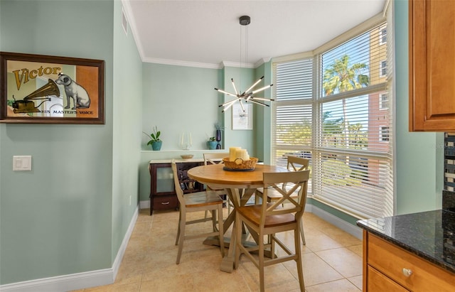 dining area with crown molding, light tile floors, and a chandelier