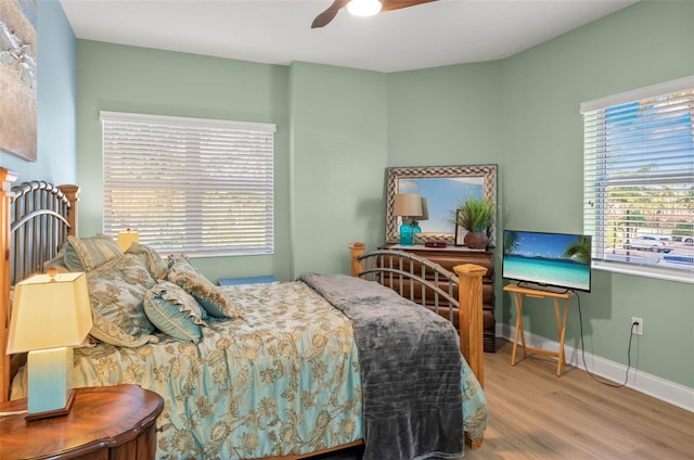 bedroom featuring ceiling fan and hardwood / wood-style flooring