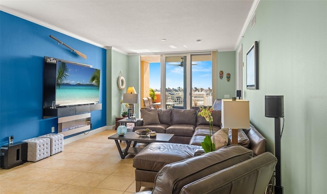 living room featuring a water view, a textured ceiling, light tile flooring, and ornamental molding