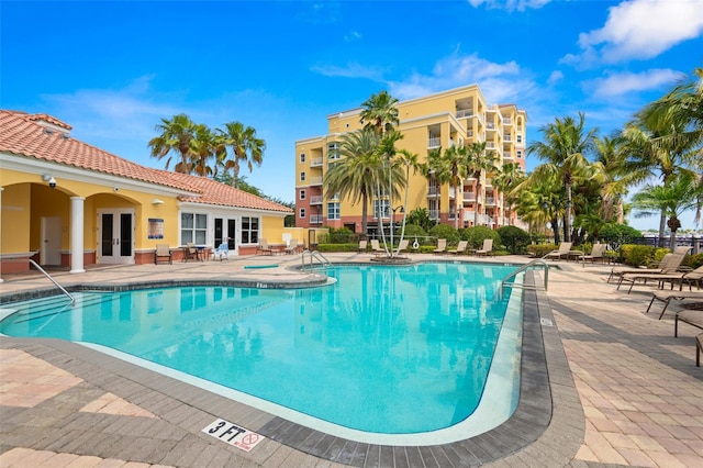 view of swimming pool featuring a patio area