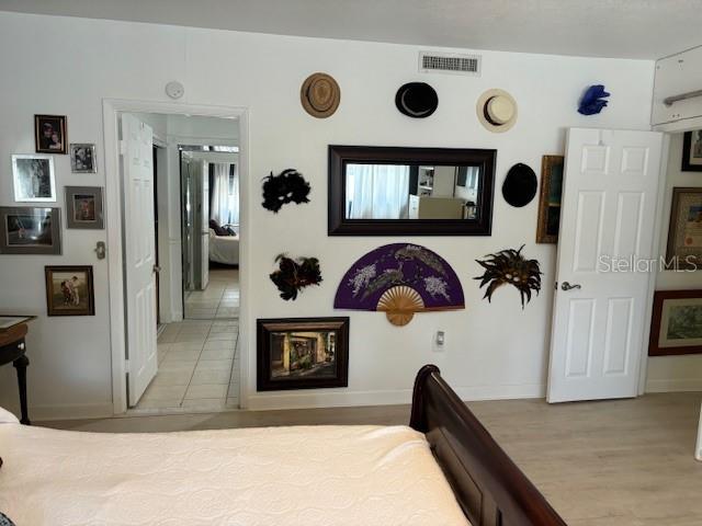 bedroom featuring light hardwood / wood-style floors