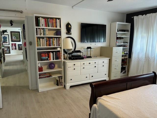 bedroom with light hardwood / wood-style flooring