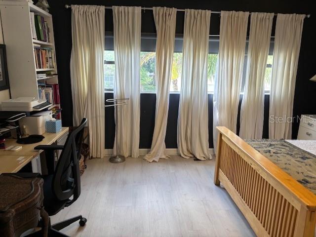 bedroom featuring light wood-type flooring