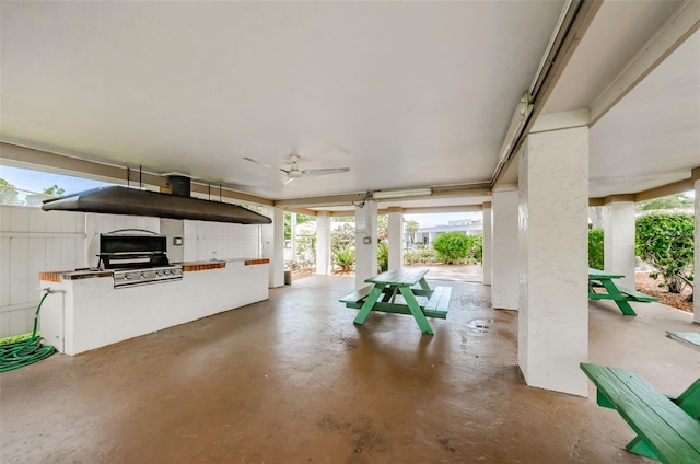 view of terrace featuring ceiling fan