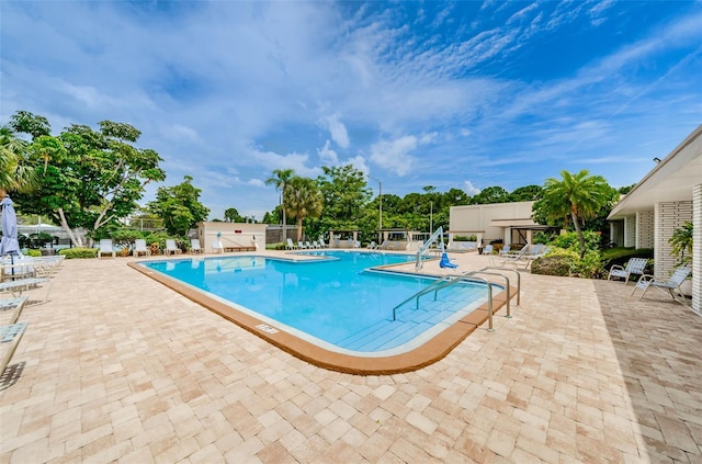 view of pool featuring a patio