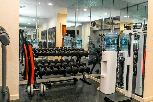 workout area featuring visible vents