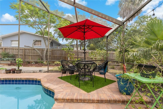 view of swimming pool with a patio