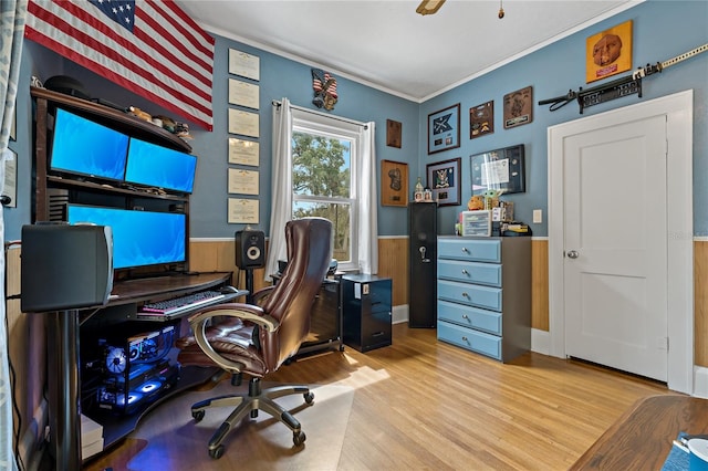 home office featuring light hardwood / wood-style flooring and ceiling fan