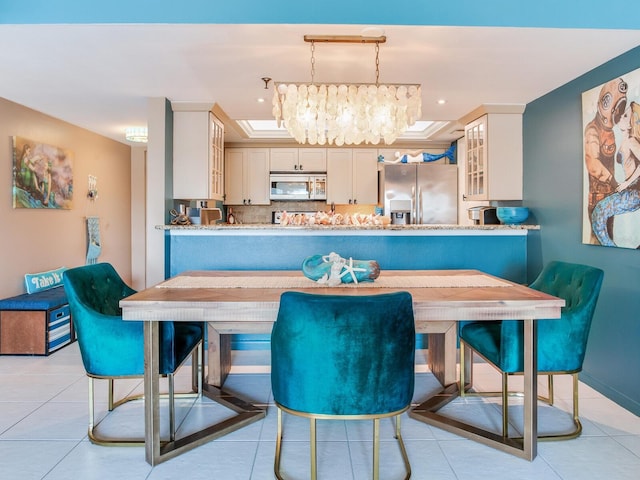 interior space with a notable chandelier and light tile floors