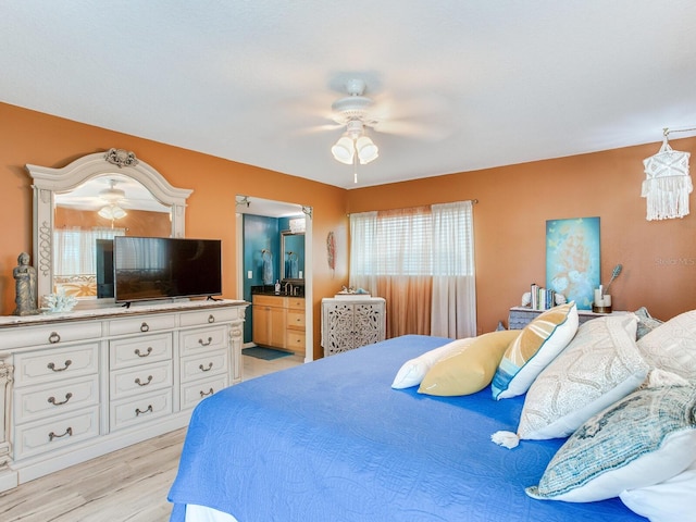 bedroom featuring ceiling fan and light wood-type flooring