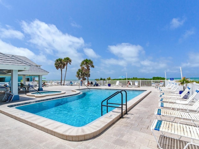 view of pool featuring a patio