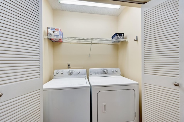 washroom featuring separate washer and dryer