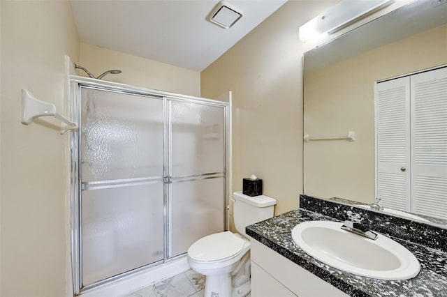 bathroom featuring an enclosed shower, toilet, tile flooring, and vanity