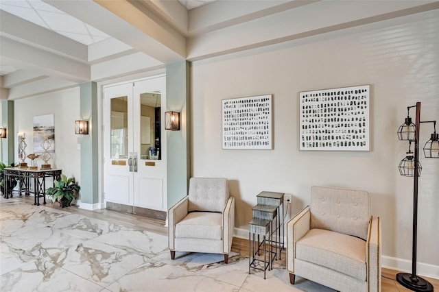 sitting room featuring tile floors