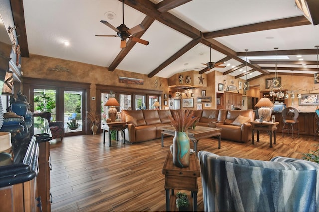 living area featuring a ceiling fan, beam ceiling, high vaulted ceiling, and wood finished floors