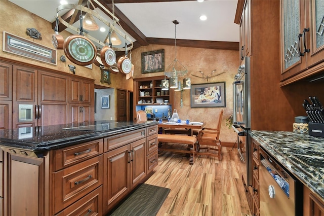 kitchen featuring light wood-style floors, brown cabinets, dark stone counters, beamed ceiling, and pendant lighting