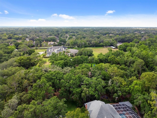 drone / aerial view with a view of trees