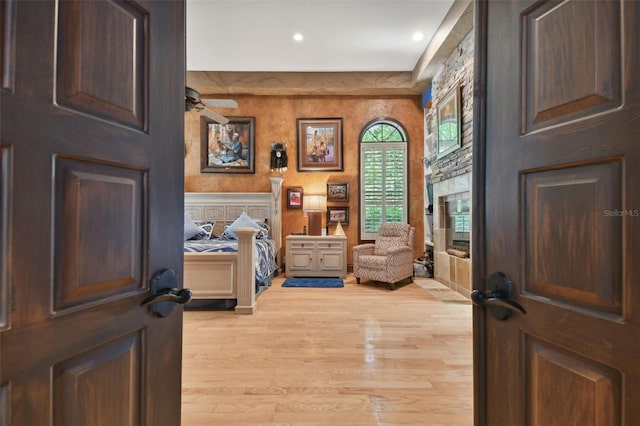 bedroom featuring light wood-style flooring