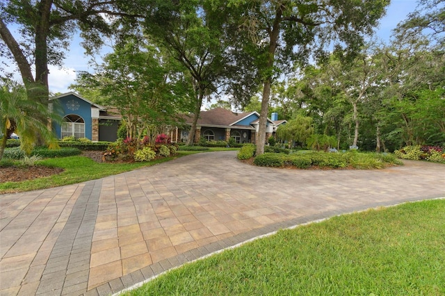 view of front of property with a front lawn