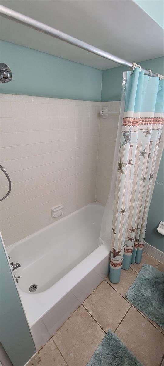 bathroom featuring tile floors