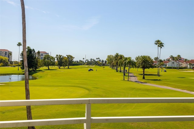 view of nearby features featuring a water view and a yard