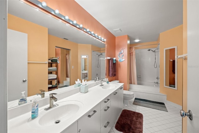 full bathroom featuring toilet, vanity with extensive cabinet space, tile flooring, shower / tub combo with curtain, and double sink