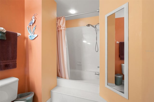 bathroom with tile flooring and toilet