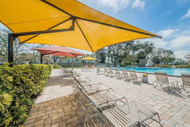 view of terrace with a community pool