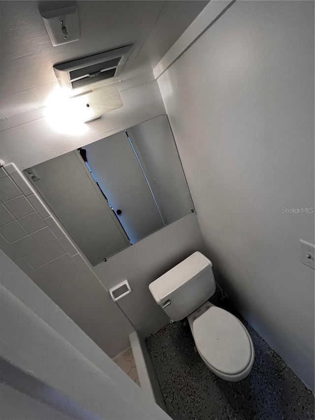 bathroom featuring toilet