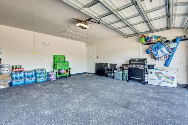 garage featuring a garage door opener