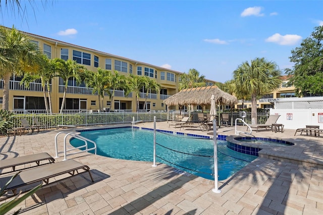 view of swimming pool featuring a patio area