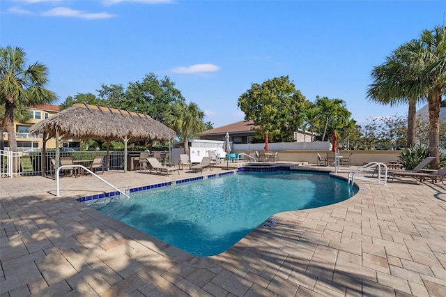 view of pool featuring a patio