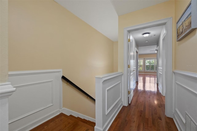 corridor featuring dark hardwood / wood-style floors