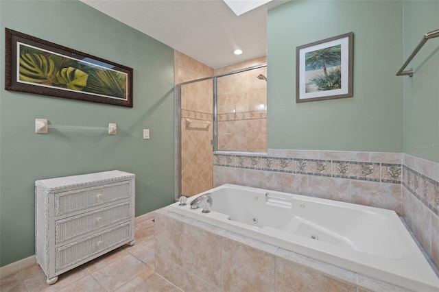 bathroom with a skylight, tile floors, and independent shower and bath