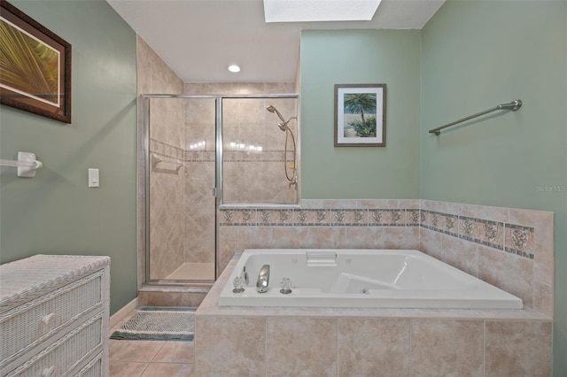 bathroom featuring a skylight, tile flooring, and plus walk in shower