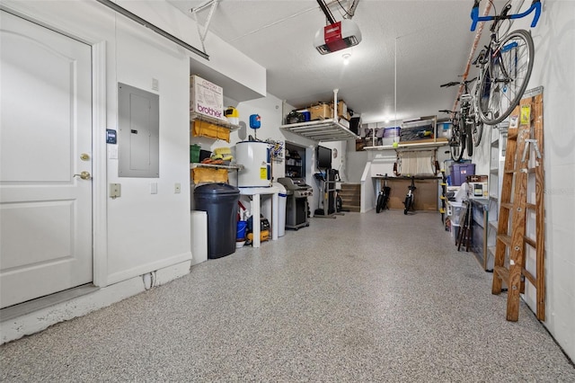 garage featuring electric water heater and a garage door opener