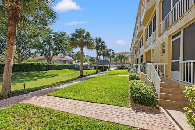 view of nearby features featuring a lawn