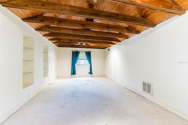 unfurnished room featuring light carpet, lofted ceiling with beams, and wood ceiling