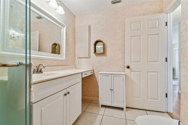 bathroom featuring vanity and tile patterned flooring