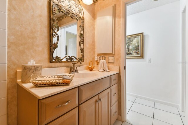 bathroom featuring vanity and tile patterned flooring