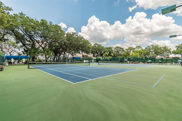 view of tennis court with basketball court