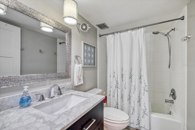 full bathroom featuring vanity, shower / bathtub combination with curtain, and toilet