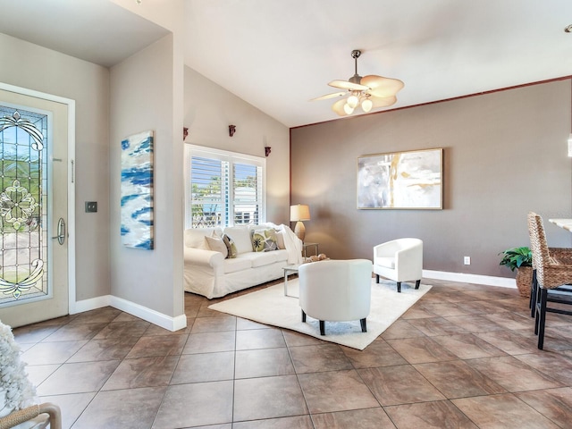 living room with ceiling fan and lofted ceiling