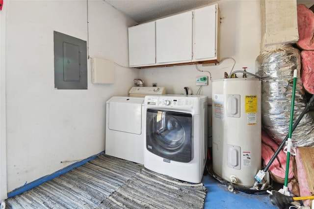 laundry area with cabinets, washing machine and dryer, and electric water heater